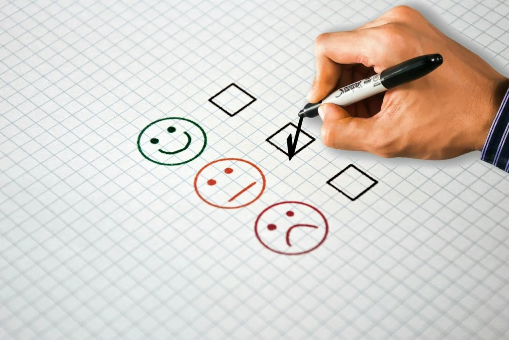 Customer filling out a brand perception survey on a tablet